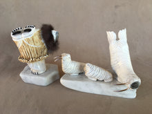 Load image into Gallery viewer, A six piece Elk antler set of a polar bear wearing a parka with a rabbit ruff. His eyes, claws and paws are inlaid pen shell. There are three walrus. A father and mother with sterling silver tusks and the third a calf with no tusks. Two white italian marble serve as icebergs.